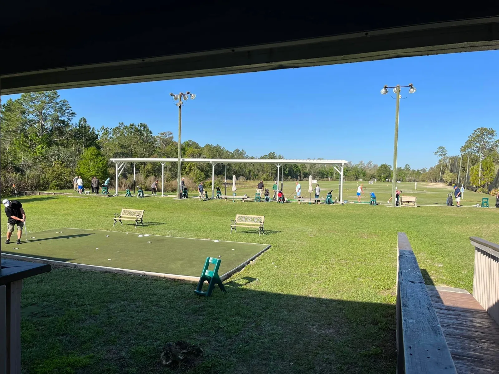 Golfers practicing at the Sweet Swing Driving Range in Homosassa